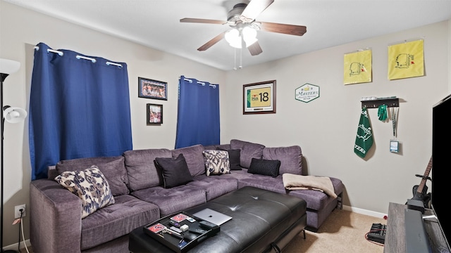 living room featuring carpet and ceiling fan