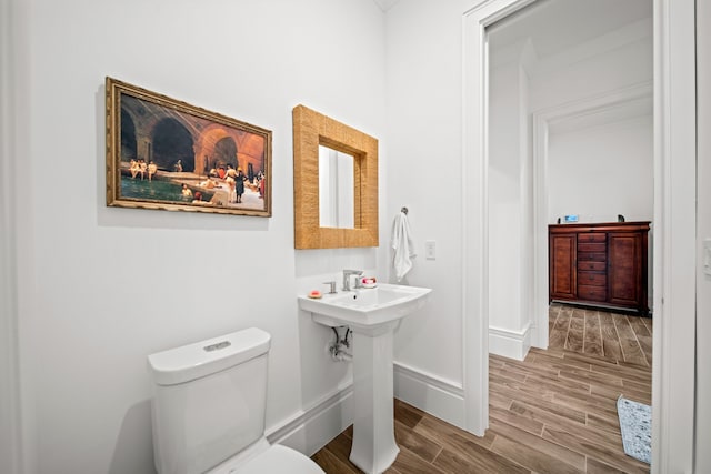 bathroom with sink and toilet