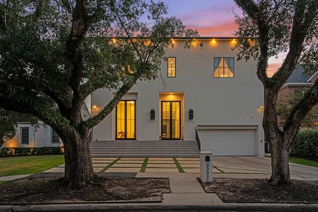 view of front of property with a garage