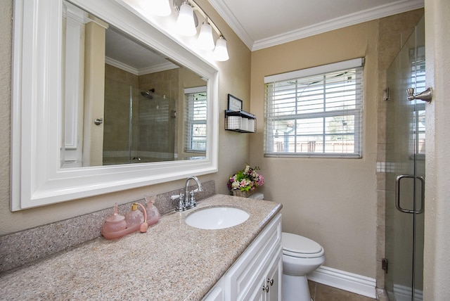 bathroom with walk in shower, ornamental molding, toilet, and vanity