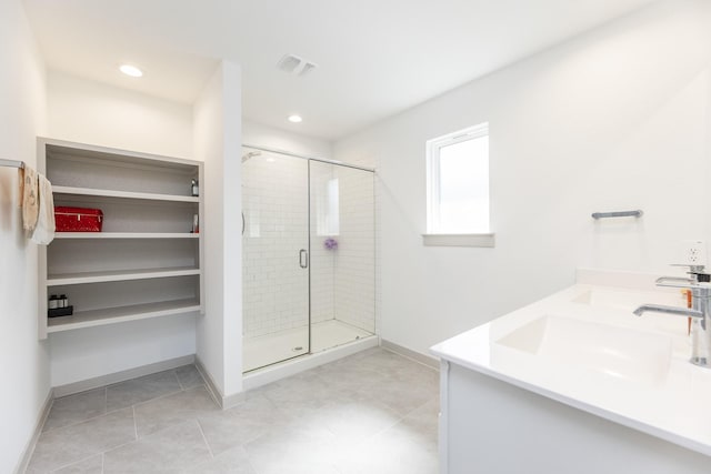 bathroom featuring vanity and walk in shower