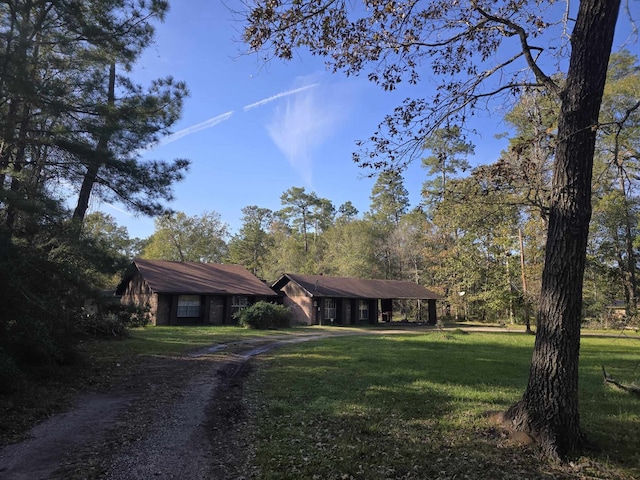 single story home with a front yard