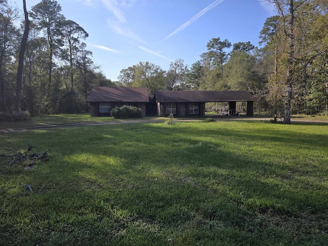 view of front of property with a front lawn