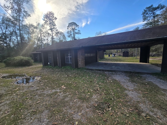 view of front of house featuring a carport