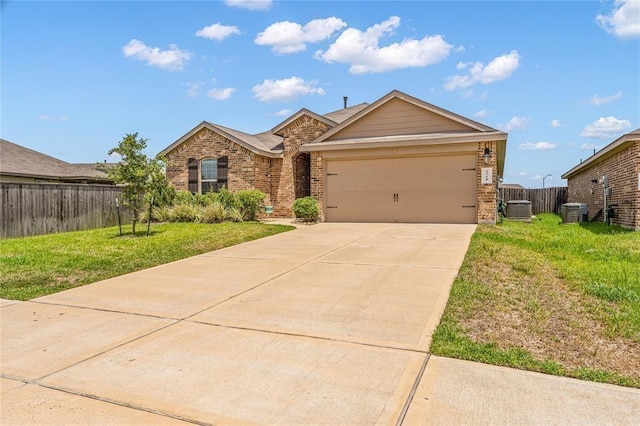 single story home featuring a front yard, a garage, and central AC unit