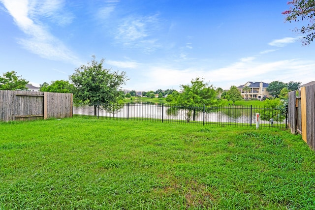 view of yard with a water view