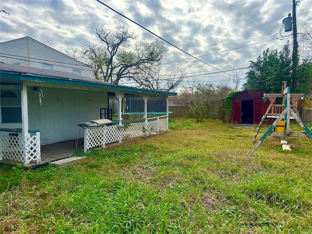 view of yard with a storage unit