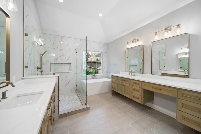 bathroom featuring separate shower and tub, tile patterned flooring, vanity, and vaulted ceiling