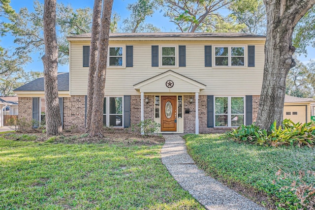 view of front of property with a front yard