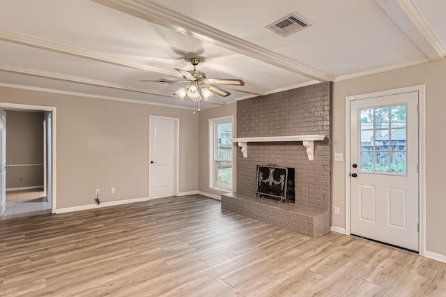 unfurnished living room featuring ceiling fan, light hardwood / wood-style flooring, ornamental molding, and a brick fireplace