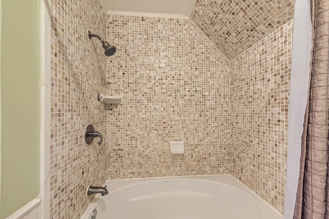 bathroom with shower / tub combo with curtain