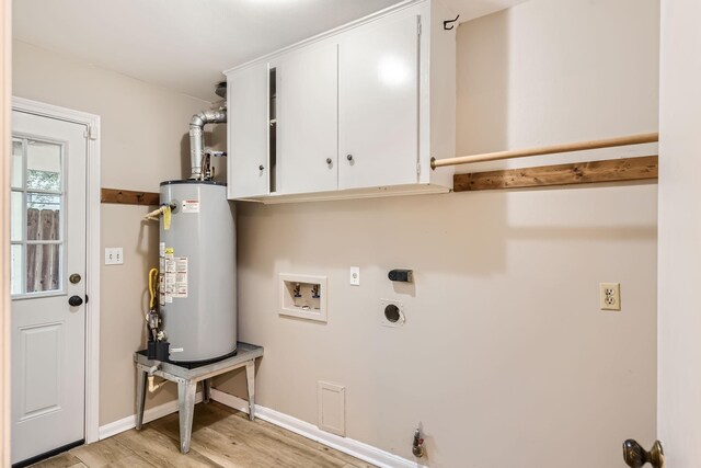 clothes washing area featuring cabinets, washer hookup, hookup for an electric dryer, water heater, and light hardwood / wood-style floors