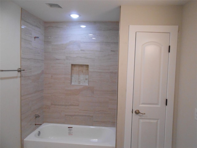 bathroom with shower / bath combination