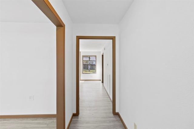 hallway featuring light hardwood / wood-style flooring