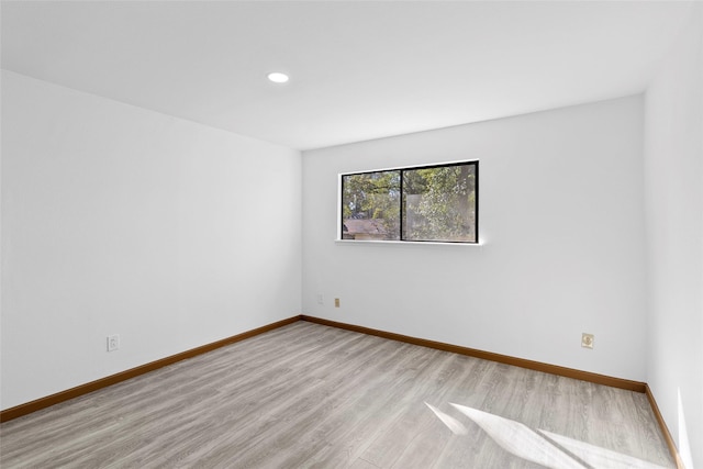 empty room featuring light hardwood / wood-style floors