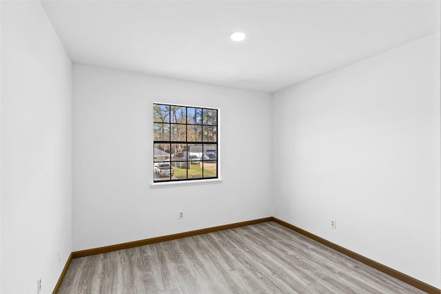 empty room with light wood-type flooring