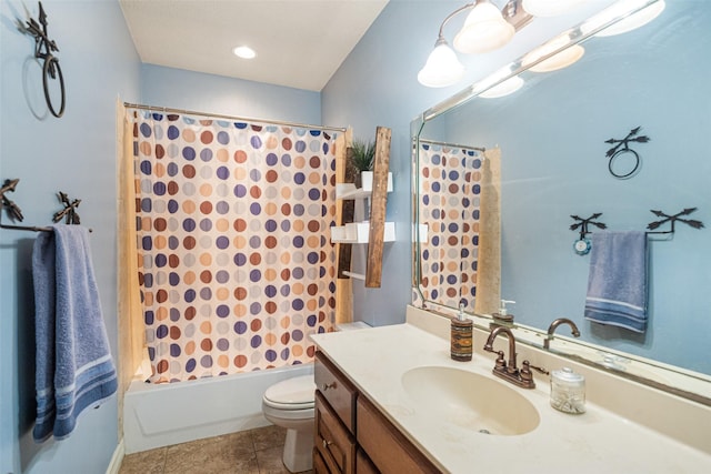 full bathroom featuring tile patterned floors, vanity, toilet, and shower / bathtub combination with curtain