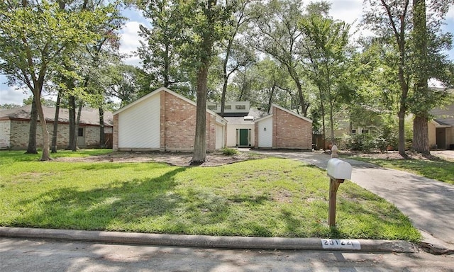 view of front of home with a front lawn