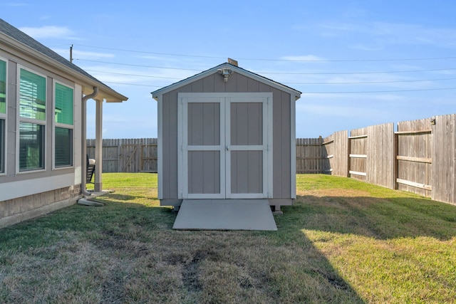 view of outdoor structure featuring a yard