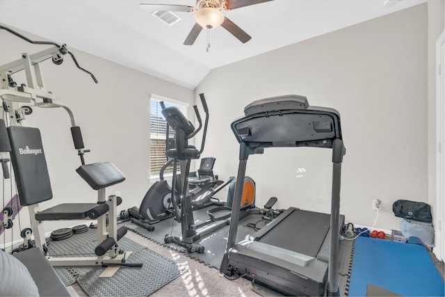 exercise area with ceiling fan and lofted ceiling