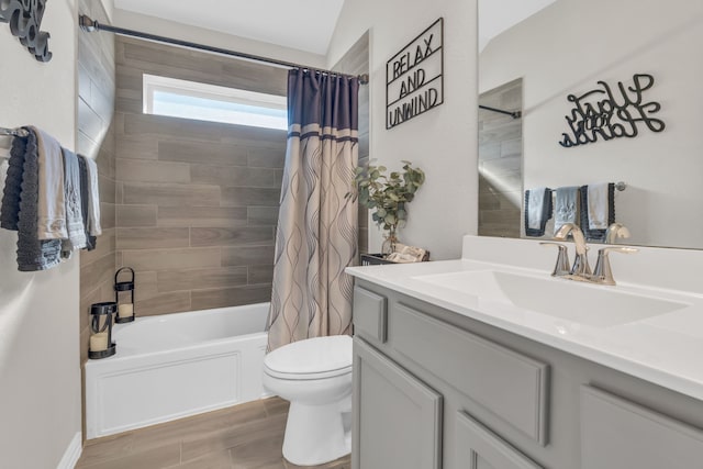 full bathroom featuring shower / bath combination with curtain, vanity, and toilet