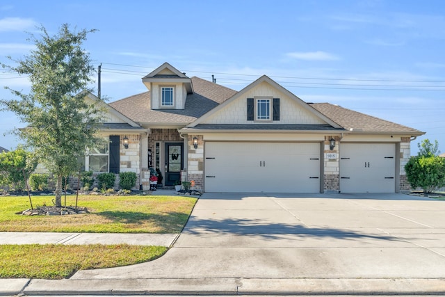 craftsman-style house with a front lawn