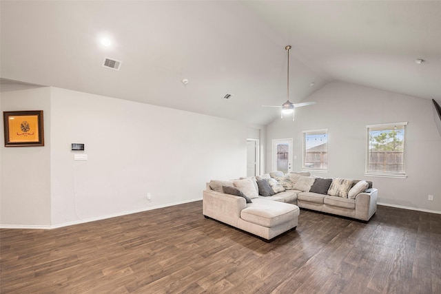 living room with ceiling fan, lofted ceiling, and dark wood-type flooring