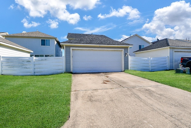 exterior space featuring a garage and a front yard