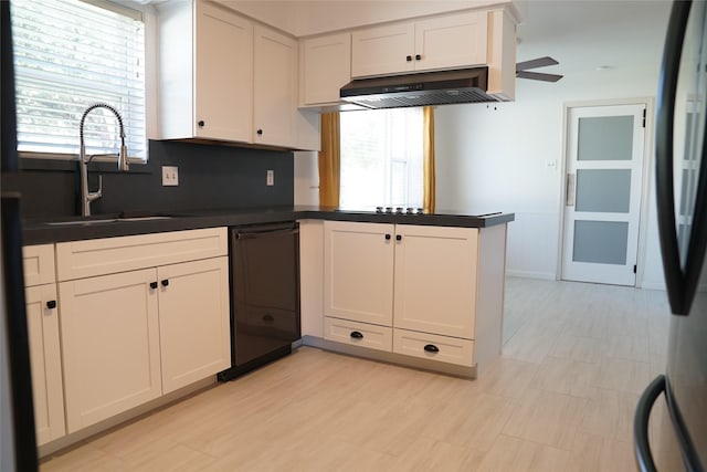 kitchen with ceiling fan, sink, tasteful backsplash, kitchen peninsula, and white cabinets