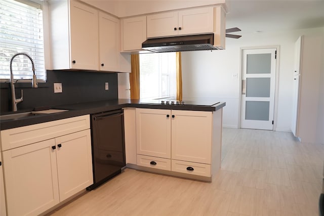 kitchen featuring white cabinets, kitchen peninsula, sink, and range hood