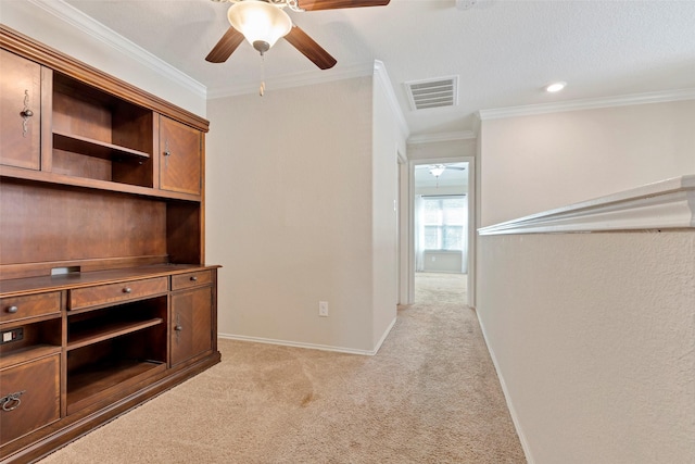 interior space with light carpet, ceiling fan, and crown molding