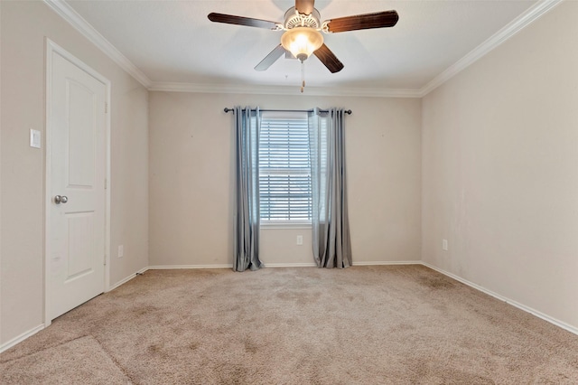 empty room featuring light carpet, ceiling fan, and ornamental molding