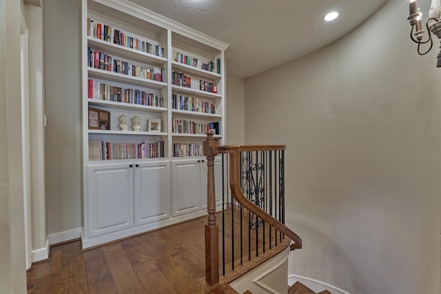 interior space featuring hardwood / wood-style floors and a textured ceiling