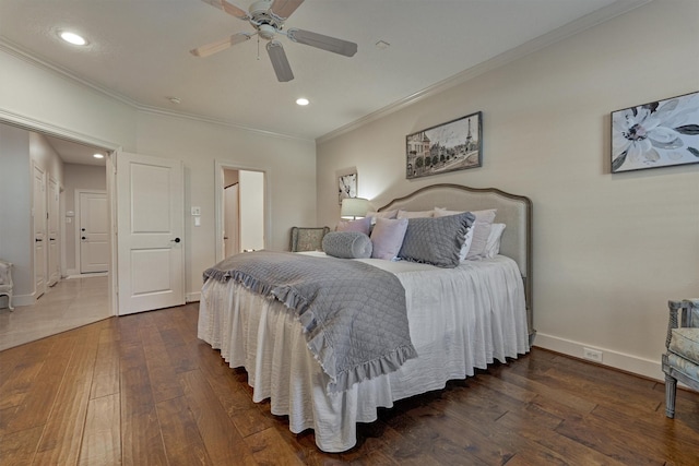 bedroom with dark hardwood / wood-style floors, ceiling fan, and crown molding