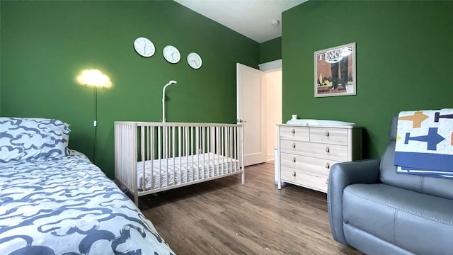 bedroom featuring hardwood / wood-style flooring