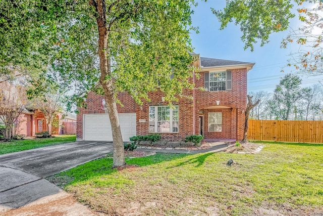 view of front of home featuring a garage and a front lawn