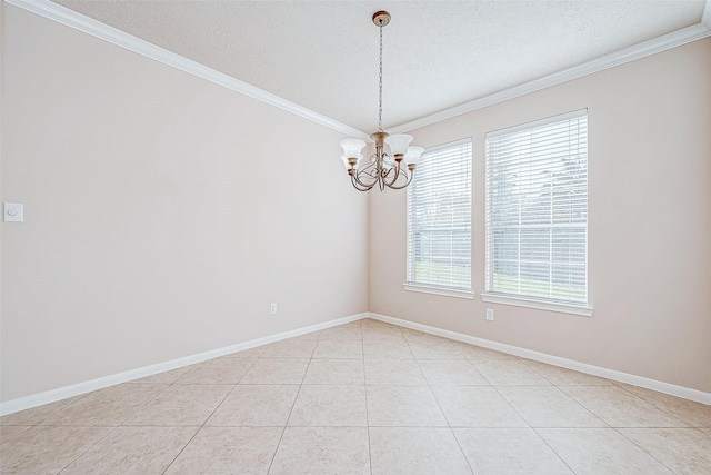 unfurnished room with light tile patterned floors, a textured ceiling, plenty of natural light, and a notable chandelier