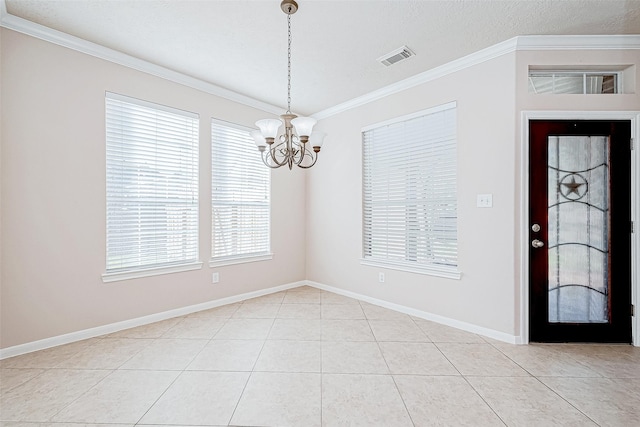 tiled empty room with crown molding and a chandelier