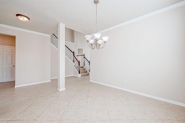 tiled empty room featuring ornamental molding, a textured ceiling, and a notable chandelier