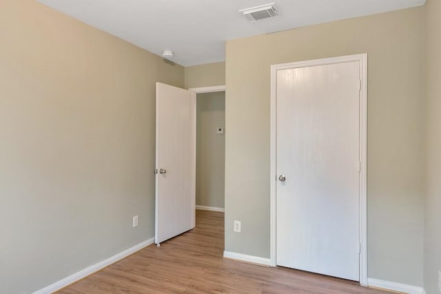 unfurnished bedroom featuring light hardwood / wood-style flooring