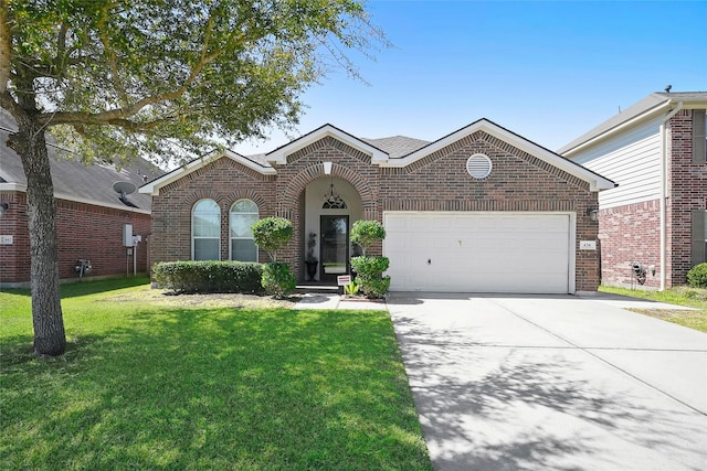 view of front facade featuring a front lawn and a garage