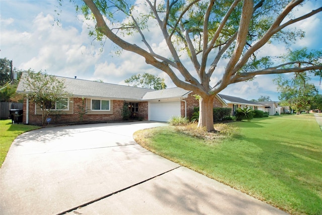 ranch-style house with a front yard and a garage