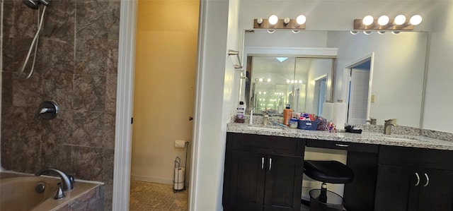 bathroom featuring shower with separate bathtub, vanity, and tile patterned floors