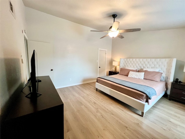 bedroom featuring ceiling fan and light hardwood / wood-style floors