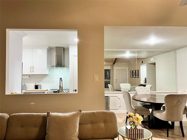 dining space with light wood-type flooring