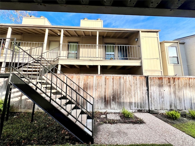 view of home's community with stairs