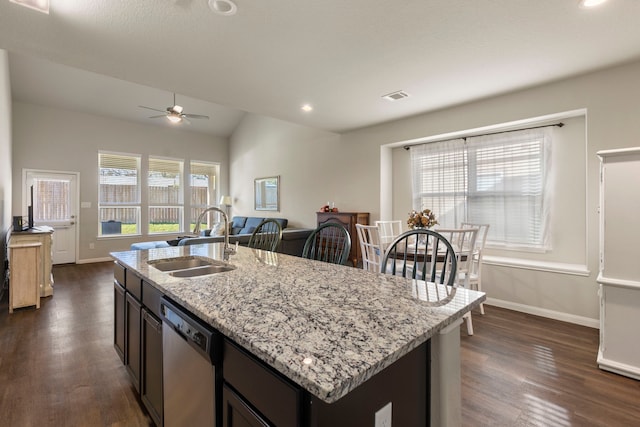 kitchen with dishwasher, a kitchen island with sink, sink, ceiling fan, and plenty of natural light