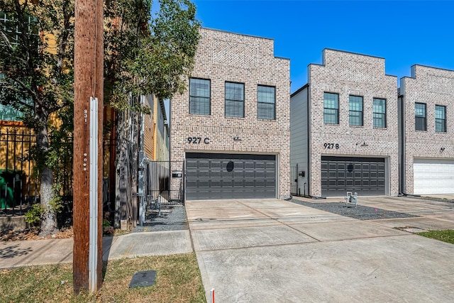 view of front of property featuring a garage