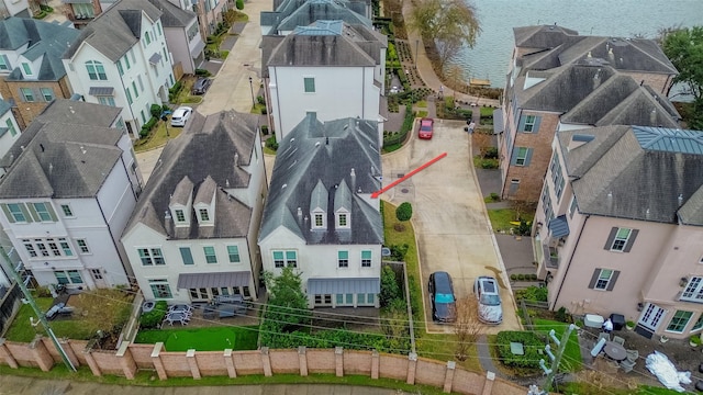 bird's eye view with a water view