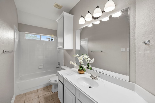 full bathroom featuring tile patterned floors, vanity, toilet, and shower / tub combination